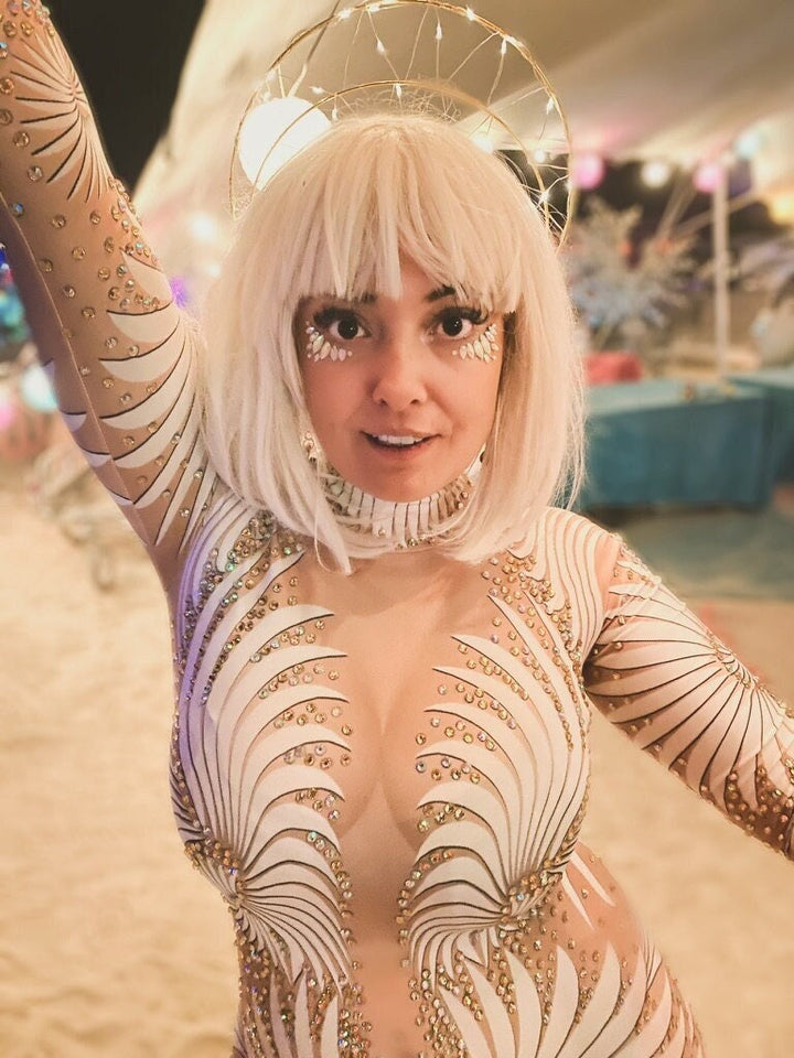 Manifestie white diamond rhinestone bodysuit — high-end festival and stage catsuit ready to ship from USA.